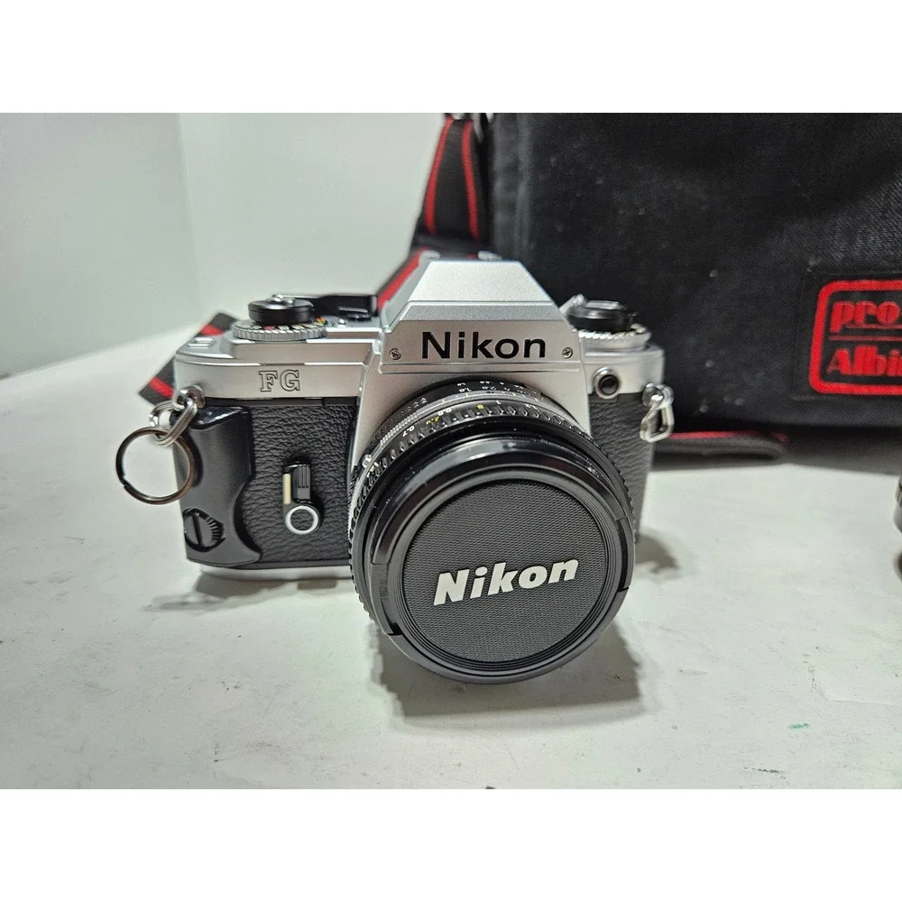 Nikon FG 35mm SLR Film Camera With Nikkor 50mm f/1.8 Albinar 70-210mm Untested